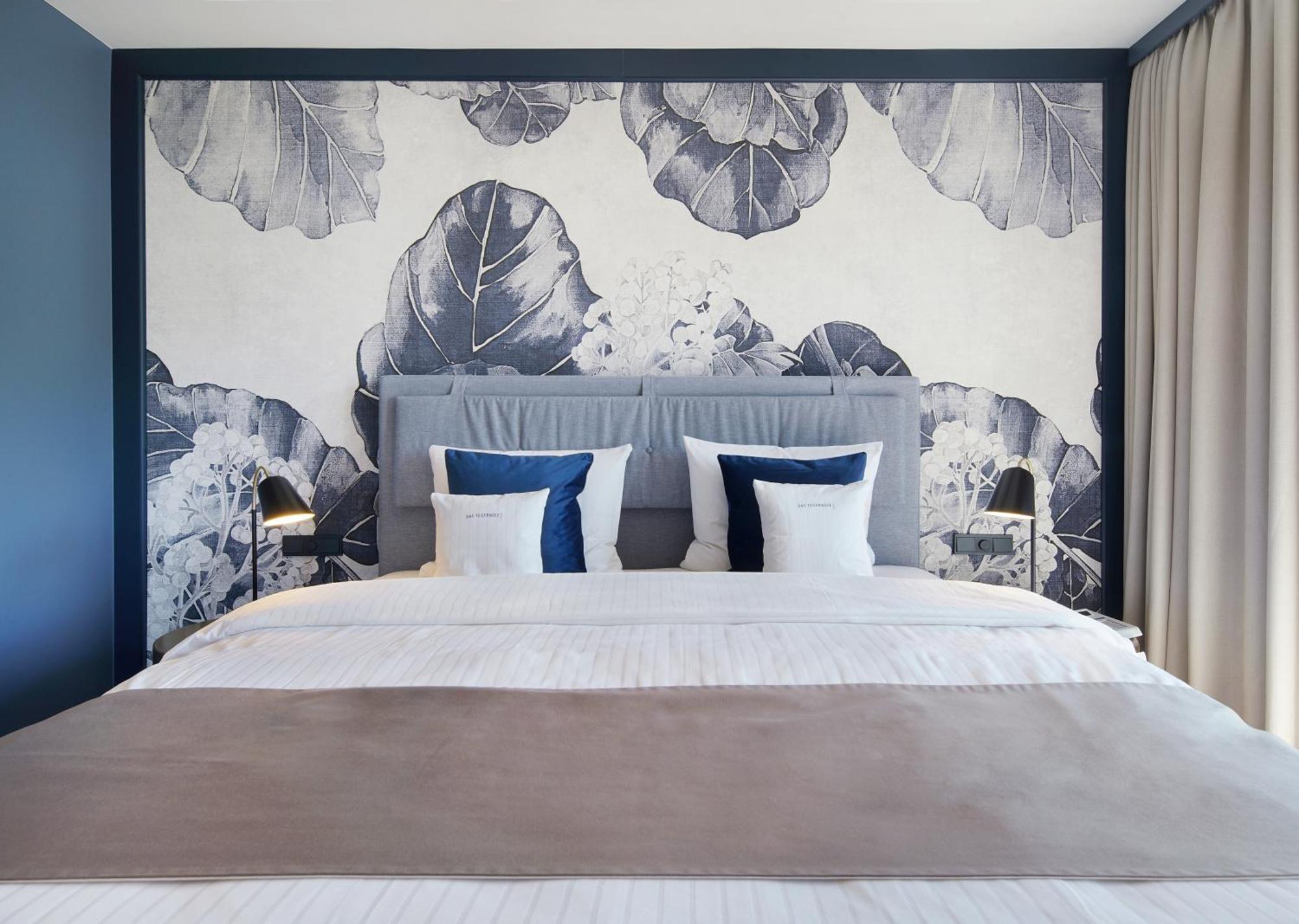 فندق داس تيغرنسي المظهر الخارجي الصورة A bedroom at the hotel